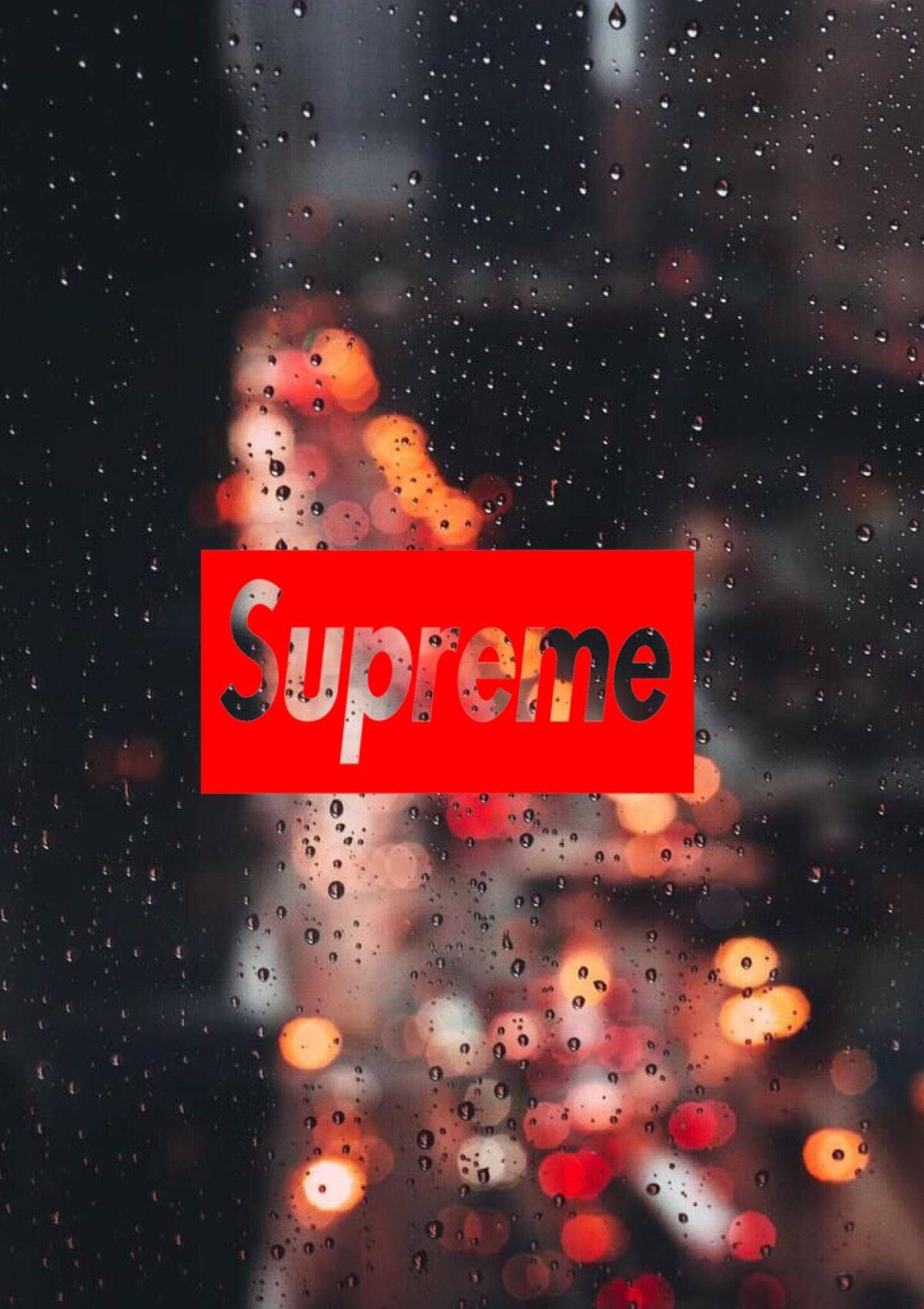 Supreme Logo With Raindrops Wallpaper