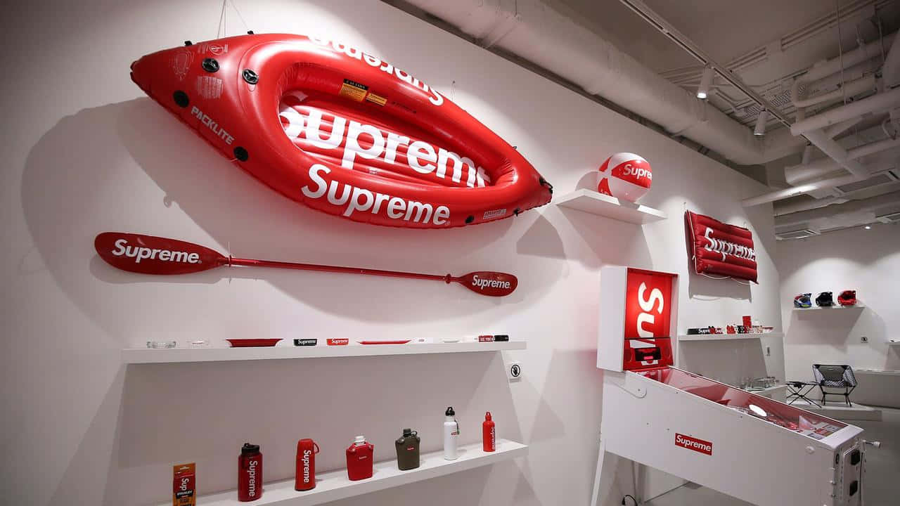 supreme - a red wall with various products