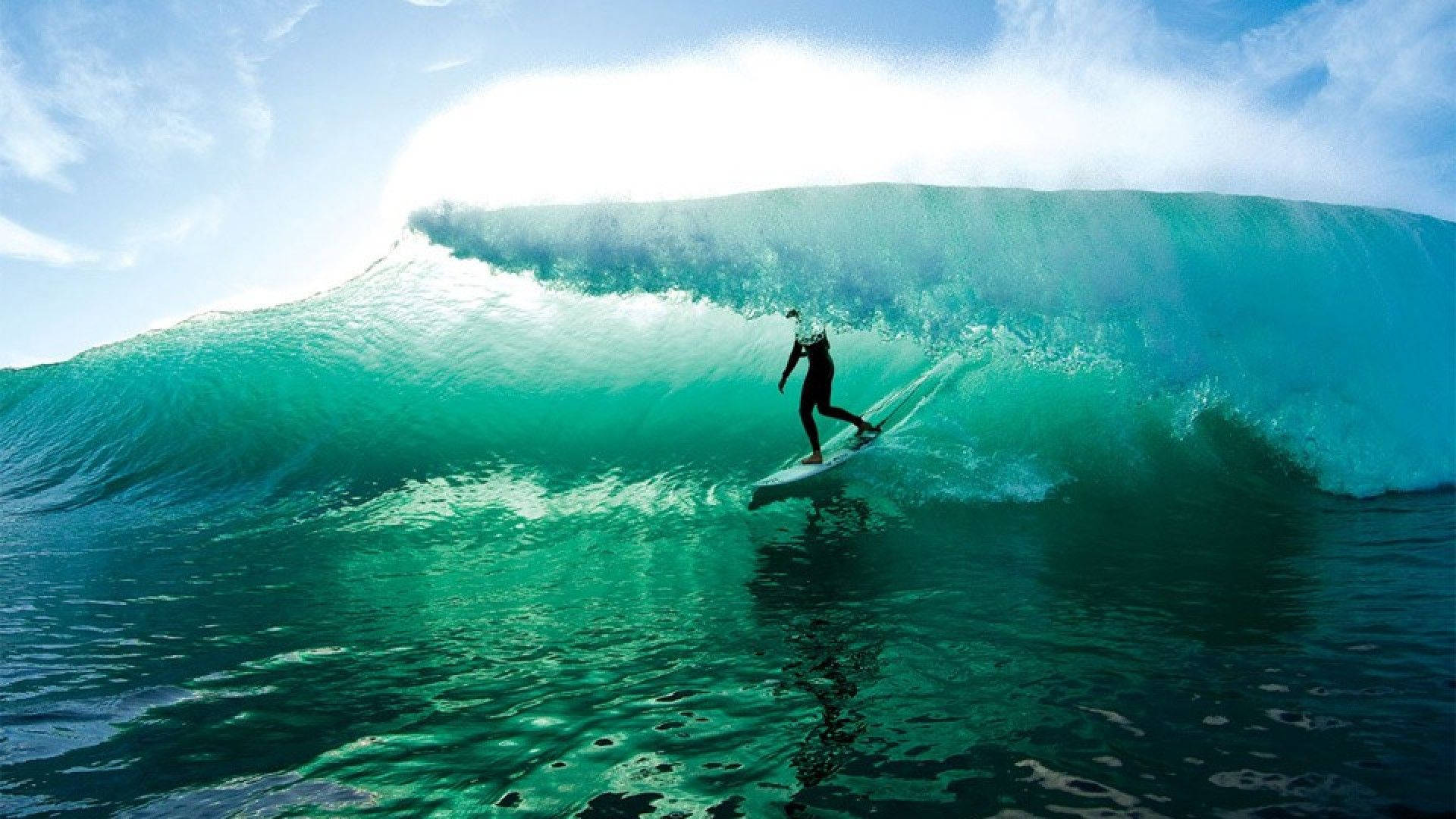 Surfer Under Ocean Waves Wallpaper