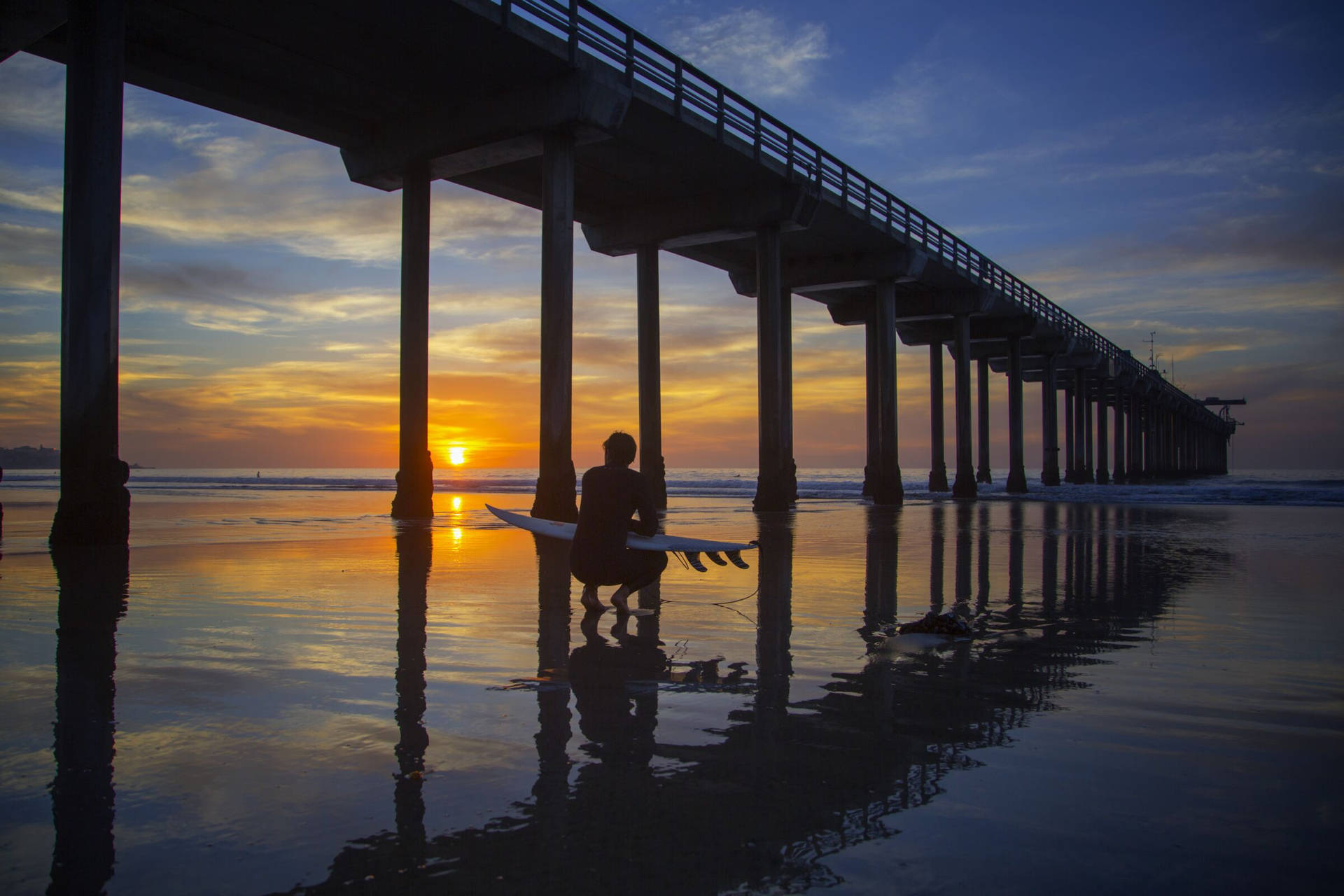 Surfer Watching Sunset At San Diego Wallpaper