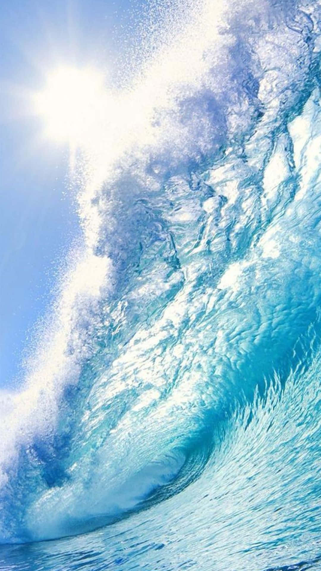 "Catching the Wave: Enjoy the ultimate surfing experience with your iPhone" Wallpaper