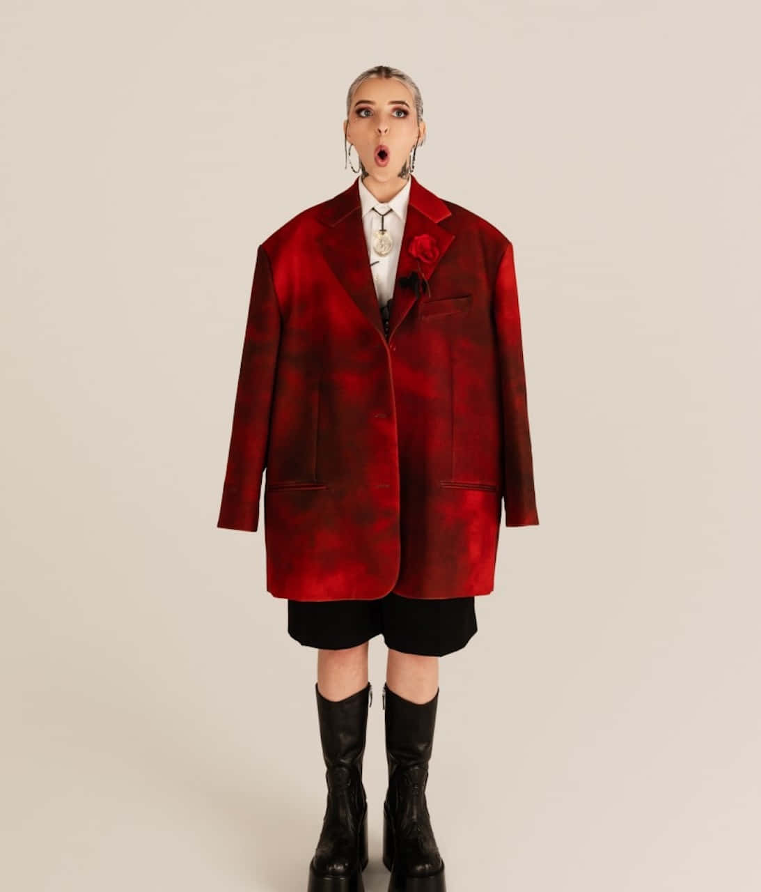 Surprised Fashion Modelin Oversized Red Jacket Wallpaper