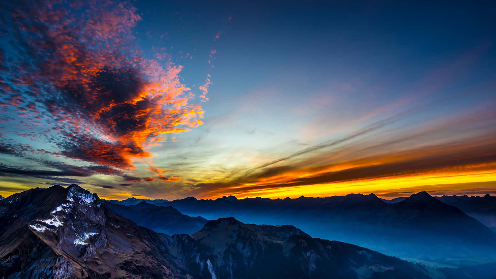 Surreal Mountains Sunset In Switzerland Wallpaper