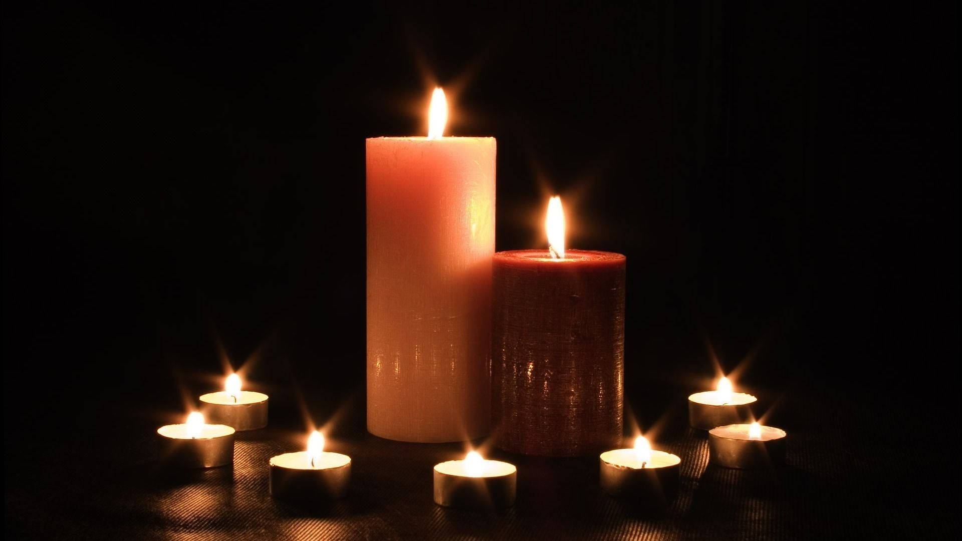 Surrounded By Candles Wallpaper