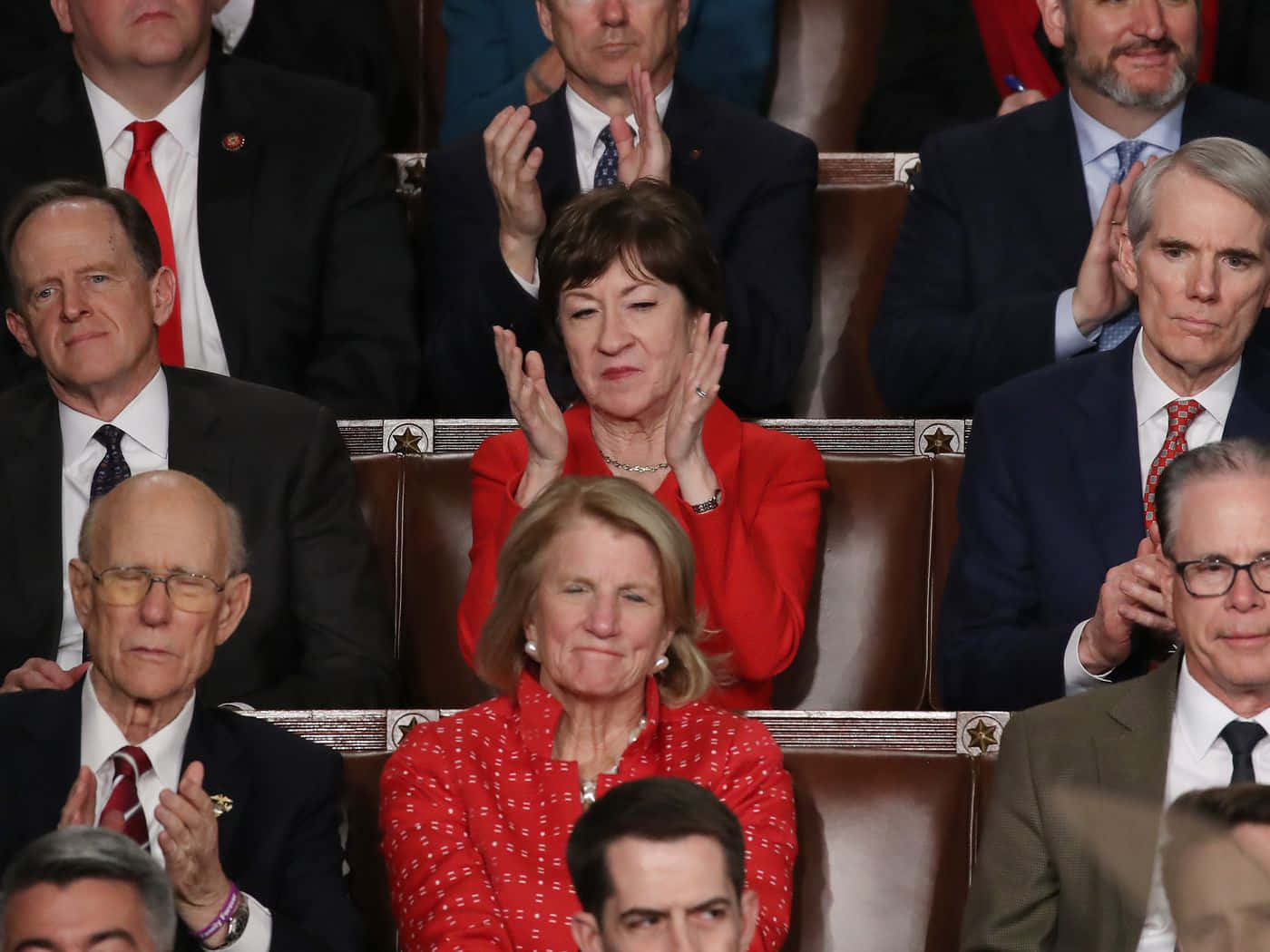 Susan Collins Clapping In Crowd Wallpaper