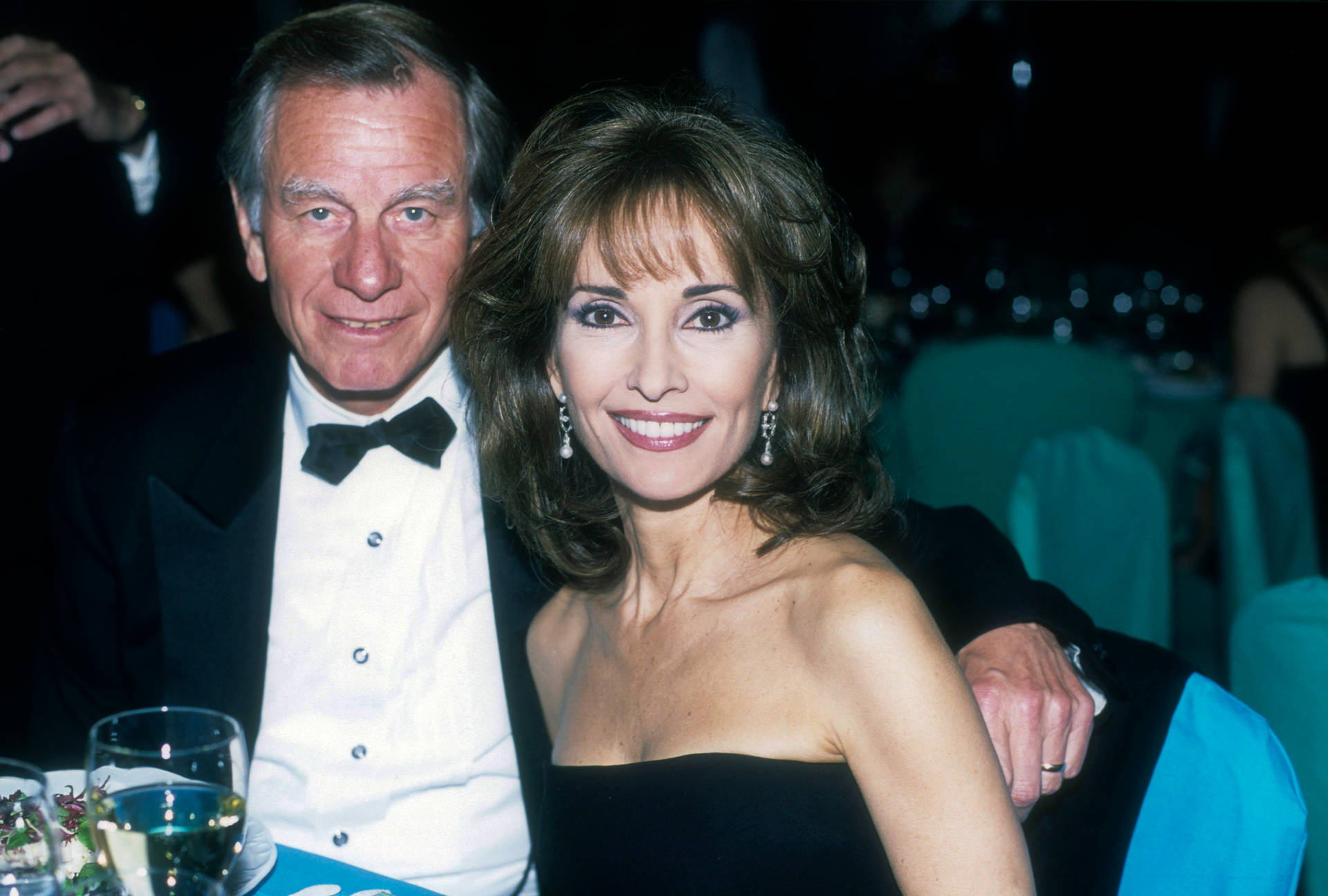 Susan Lucci And Helmut Huber At Party Background