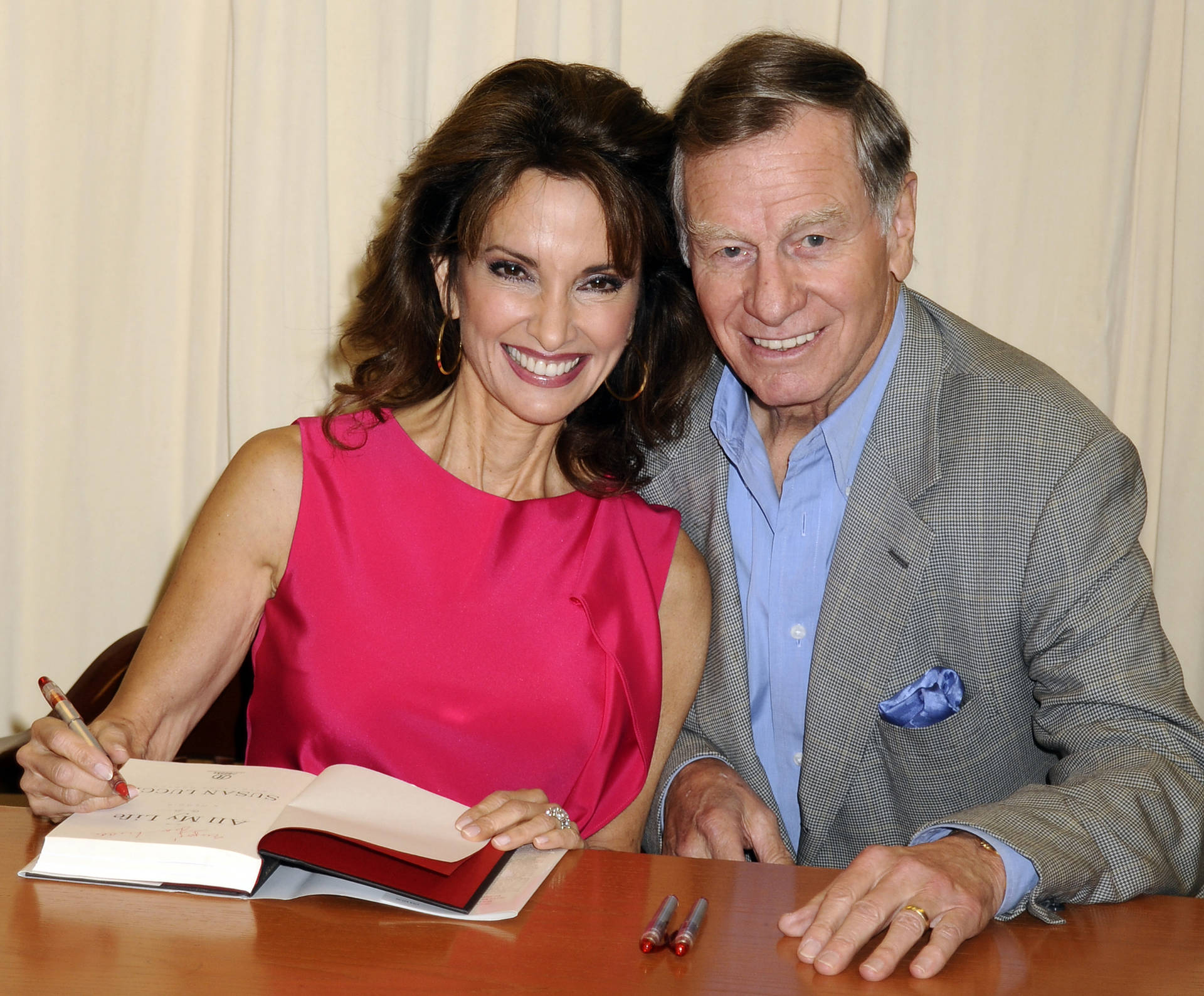 Susan Lucci And Helmut Huber Book Signing Background