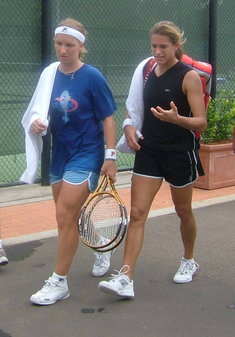 Notable professional tennis players, Svetlana Kuznetsova and Amelie Mauresmo in a match. Wallpaper