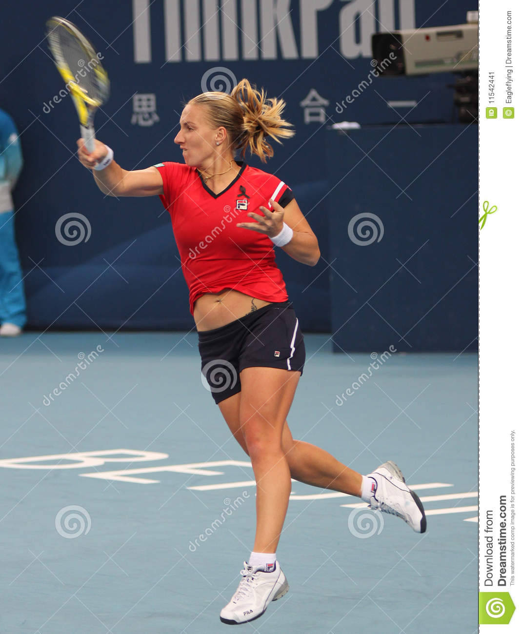 Svetlana Kuznetsova Swinging Racket Up Wallpaper