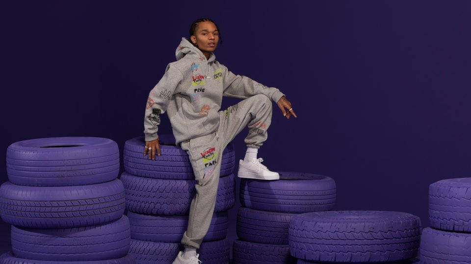 Swae Lee On Purple Tires Wallpaper