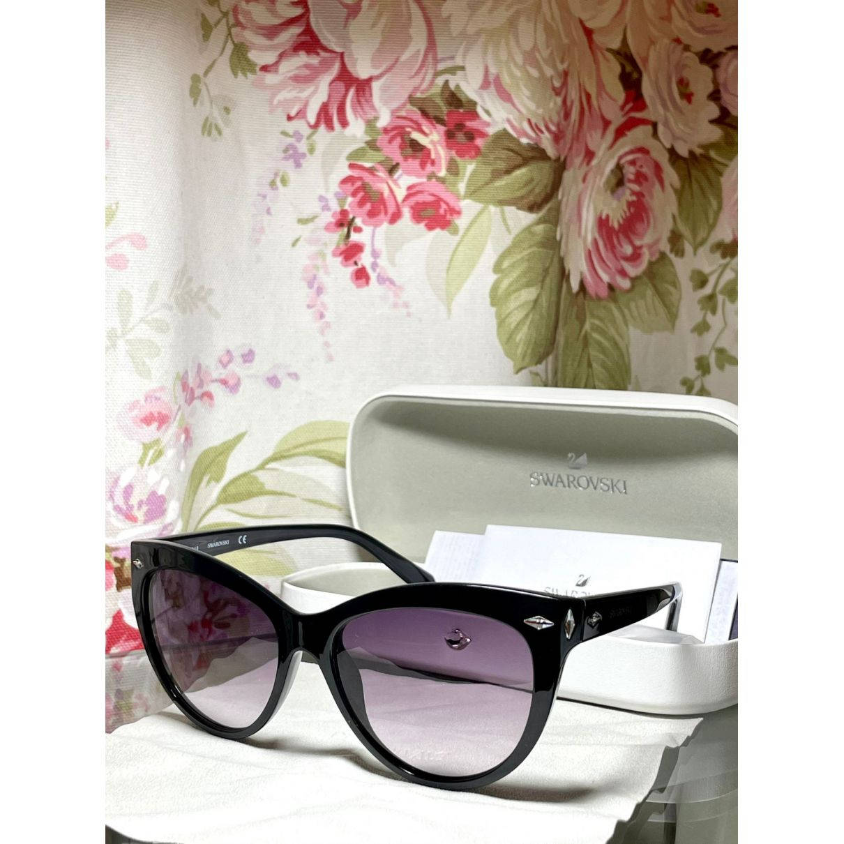 Swarovski Sunglasses Light Purple Lenses Background