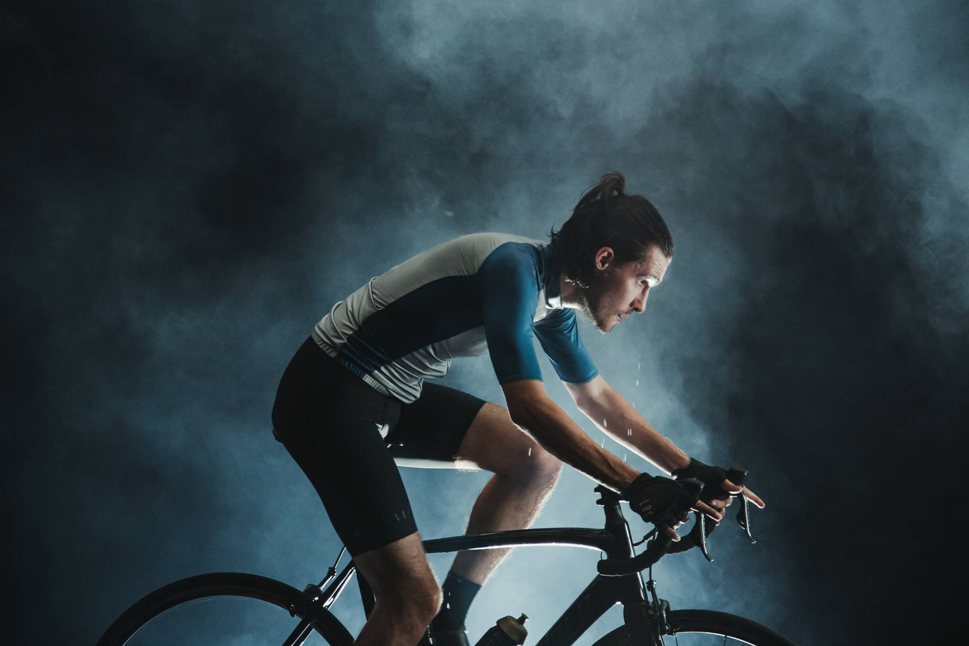 Determined Cyclist Powering Through Wallpaper