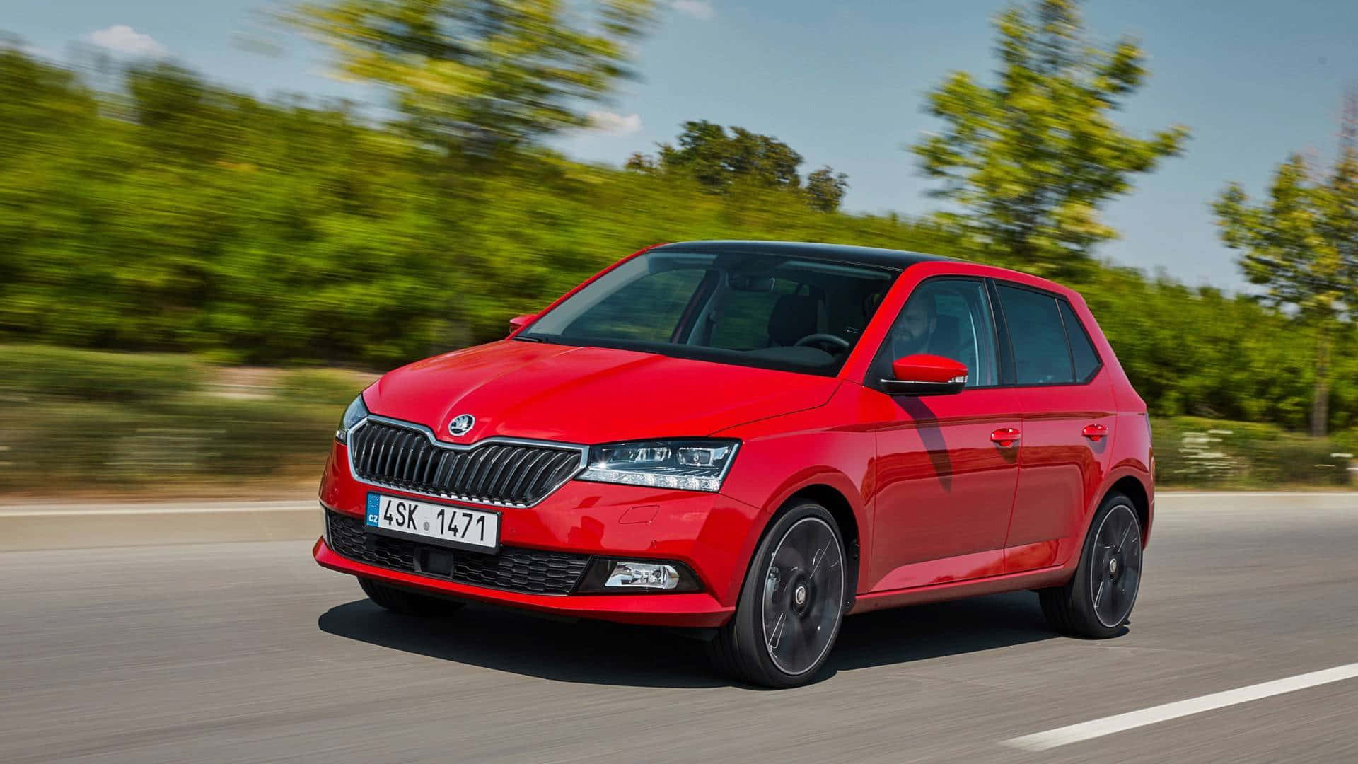 Swift And Sleek Skoda Fabia On The Move Wallpaper