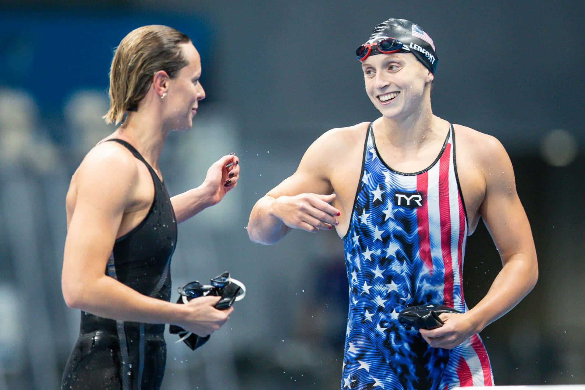 Swimmers Celebrating Victory Wallpaper