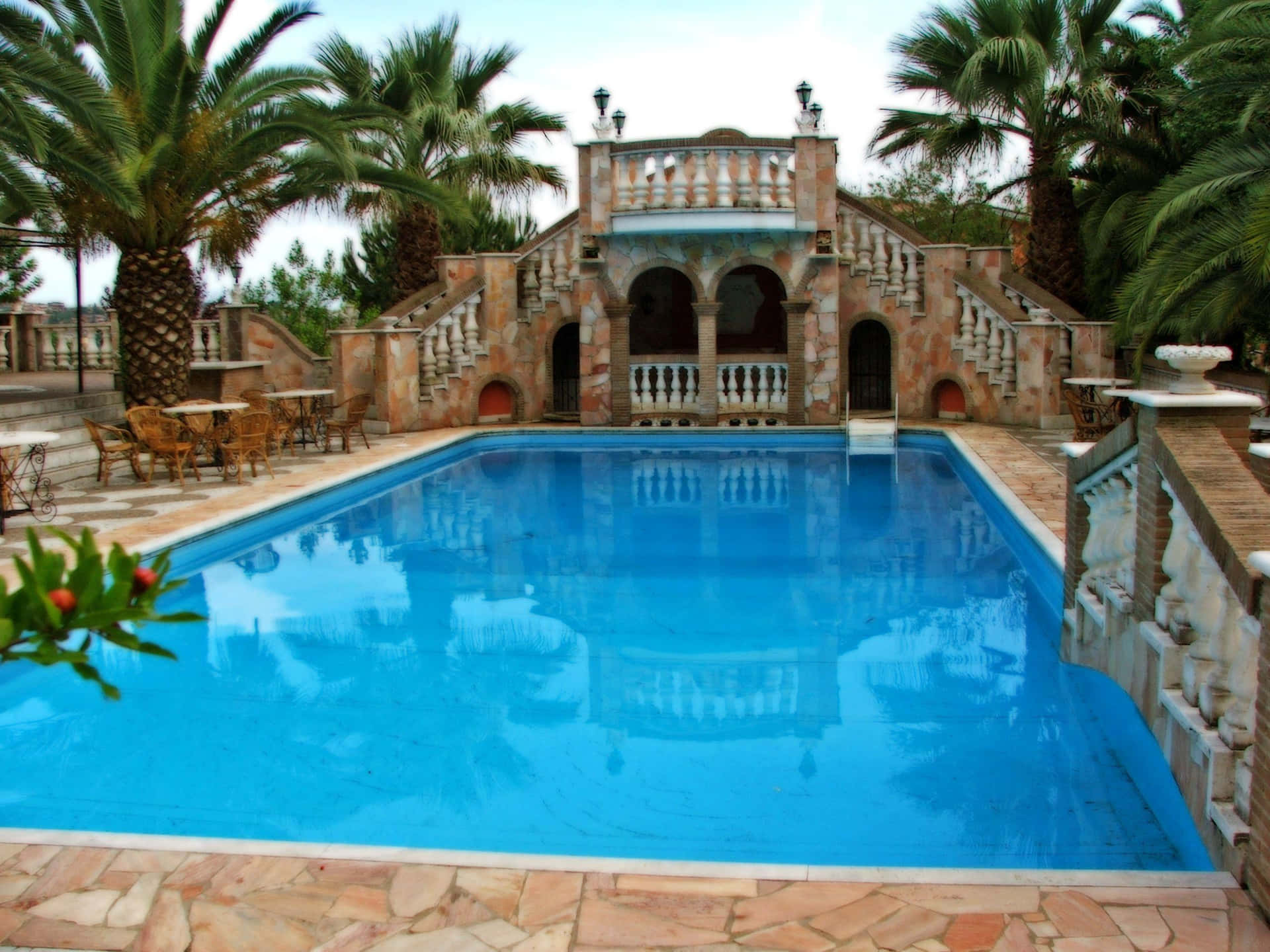 A Pool With A Stone Wall