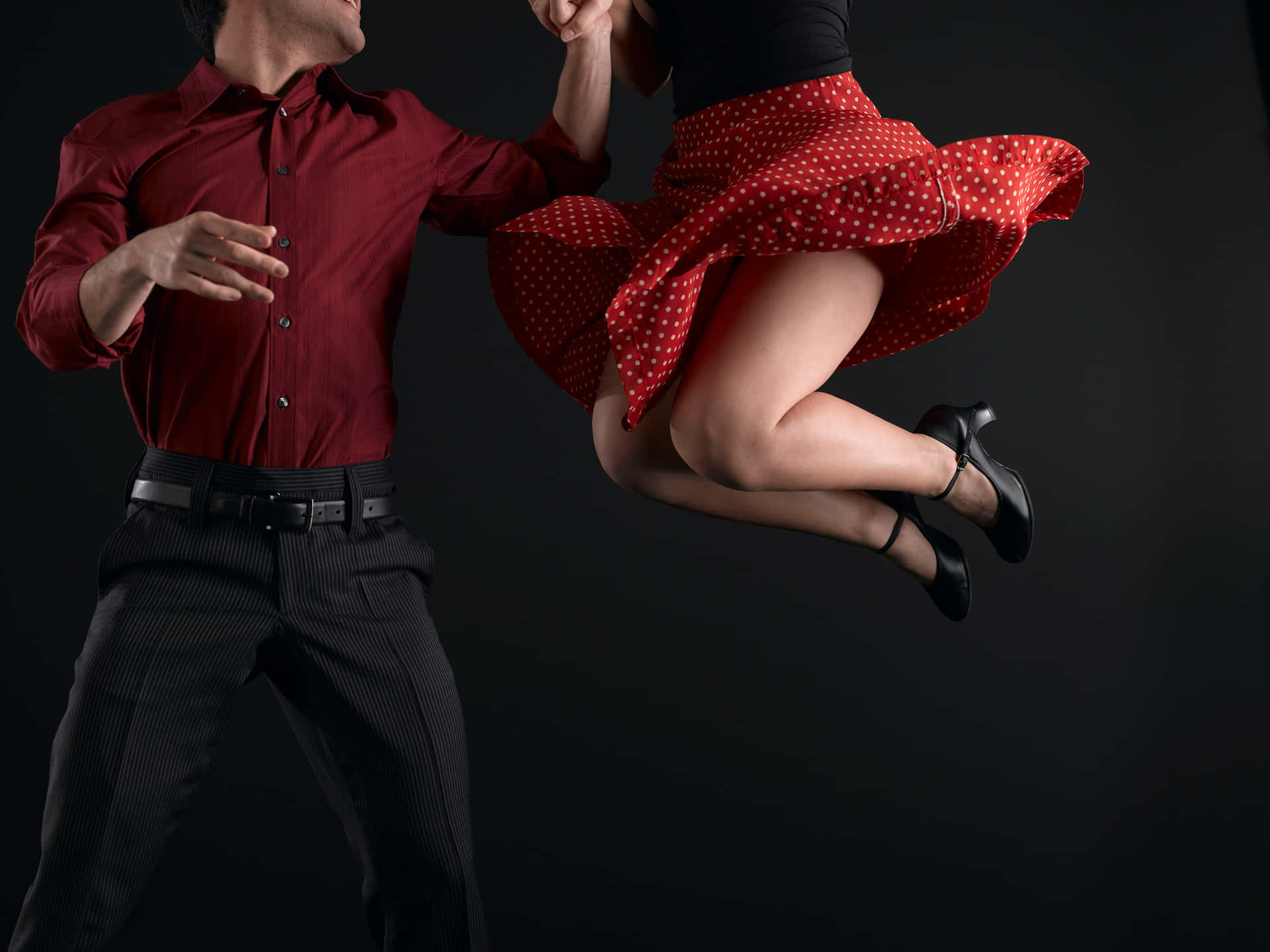 Swing Dance Couple In Action Wallpaper