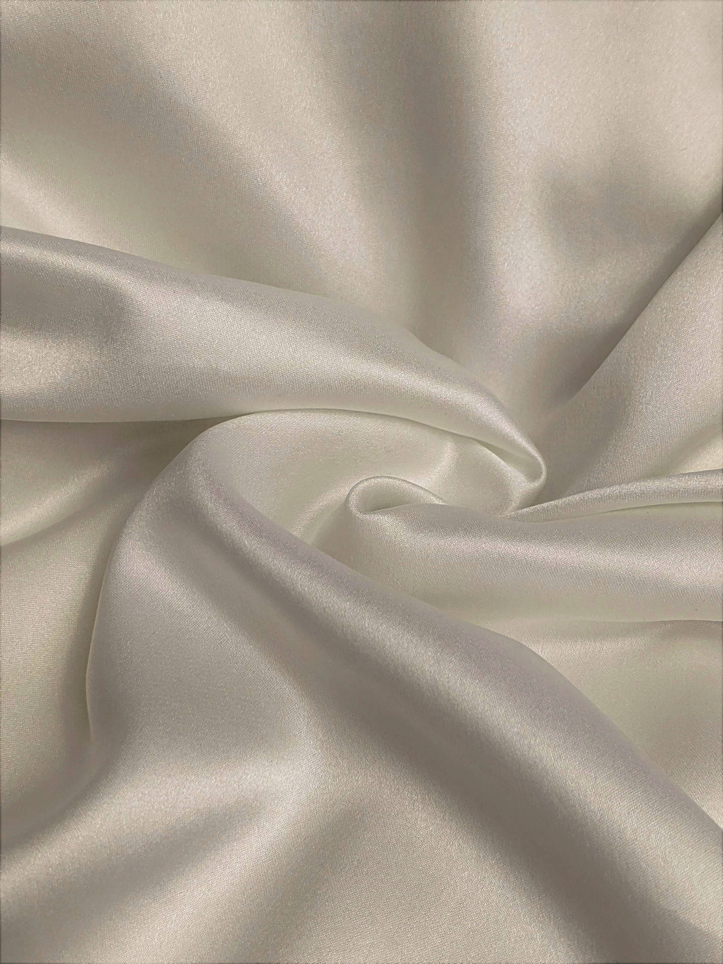 Swirled White Silk Fabric Background