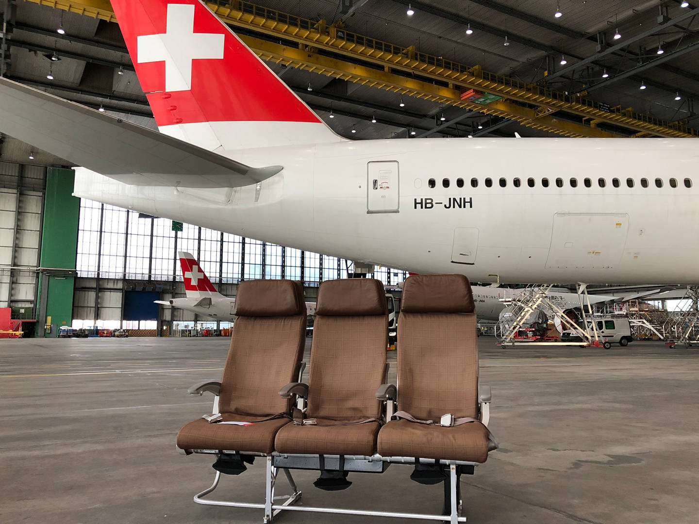 Swiss Airlines Plane With Chairs Wallpaper