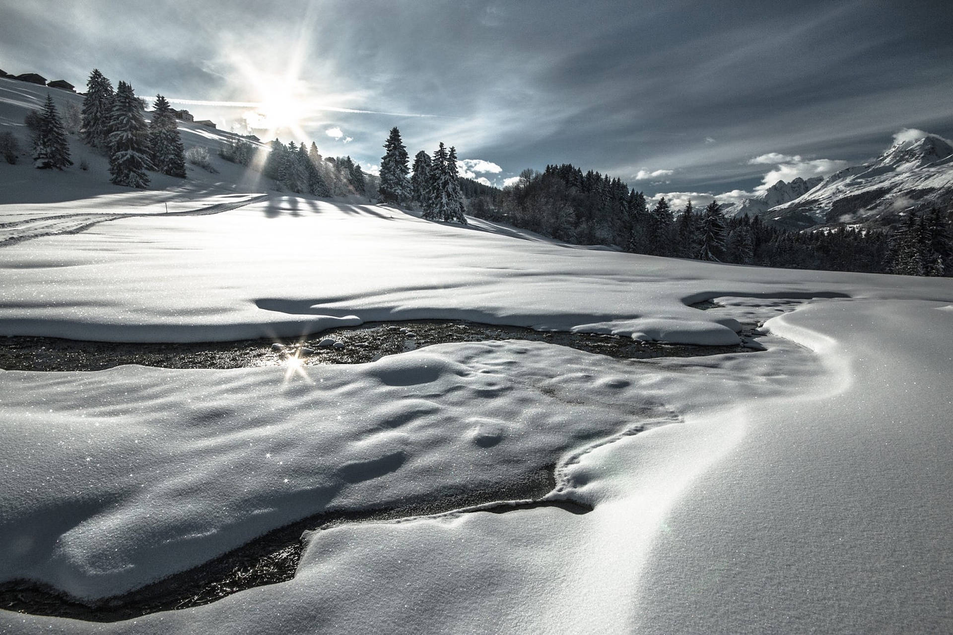 Majestic Swiss Alps Blanketed in Snow Wallpaper