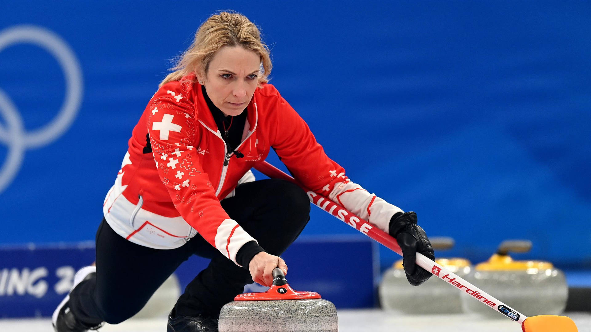 Switzerland Curling Team in Action Wallpaper
