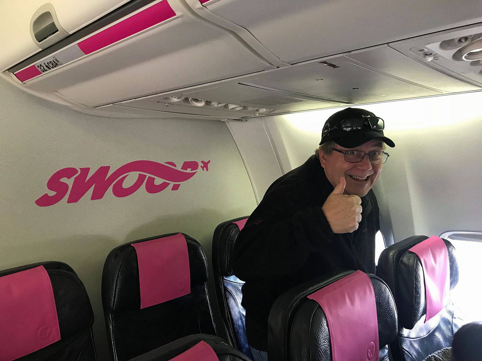 Swoop Airlines Happy Passenger Wallpaper
