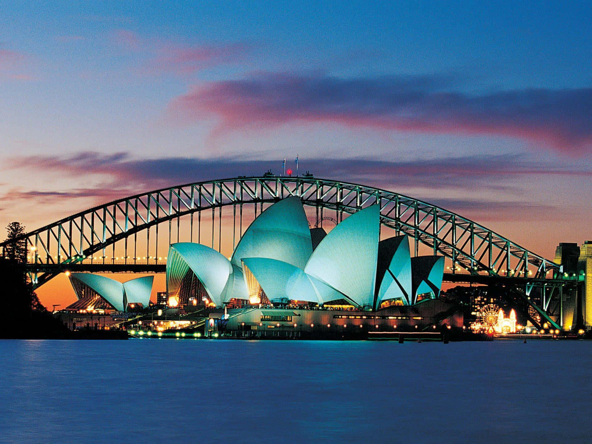 Sydney Harbour Bridgeand Opera Houseat Dusk Wallpaper