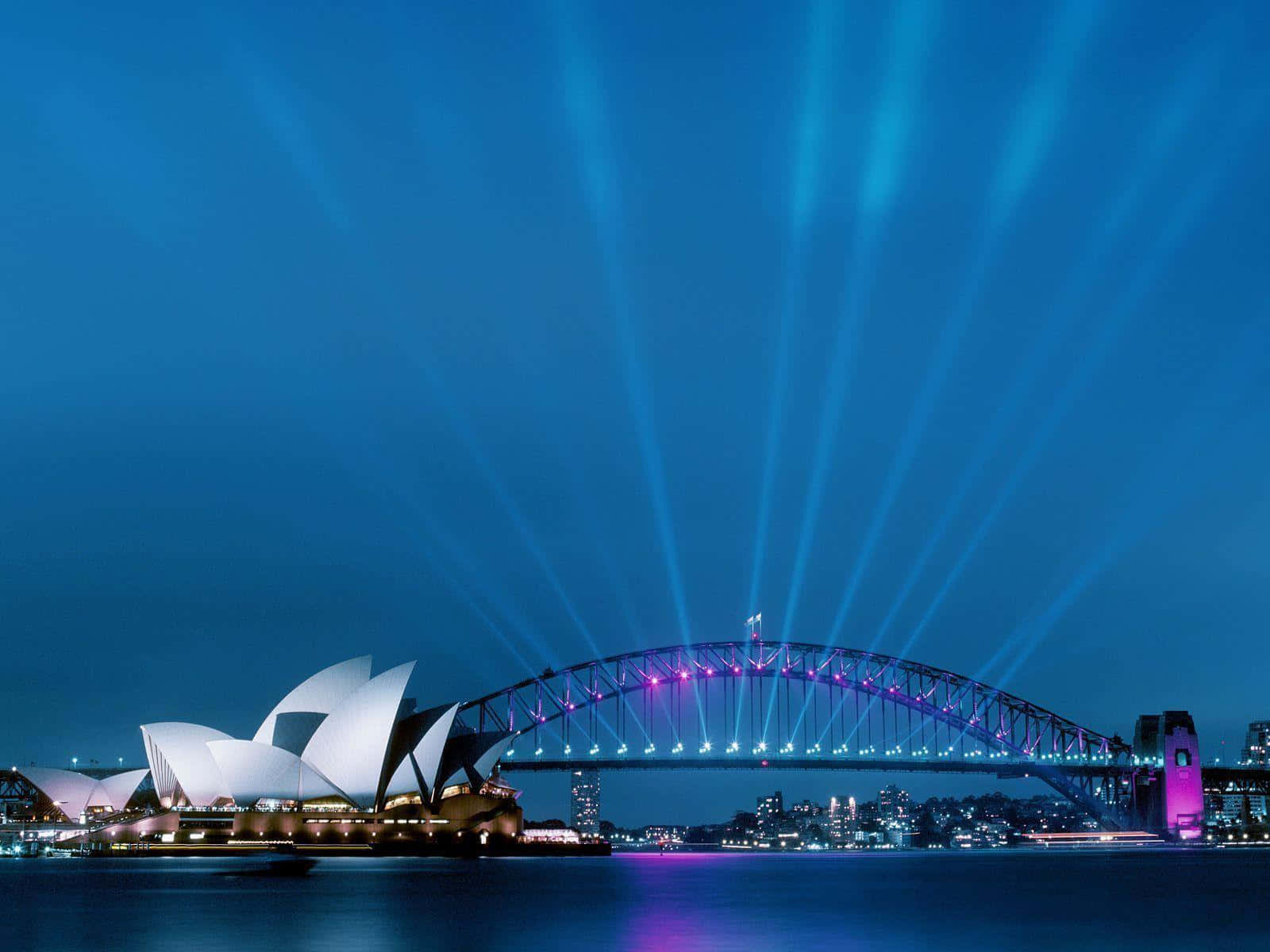 Sydney Harbour Bridgeand Opera Houseat Night Wallpaper