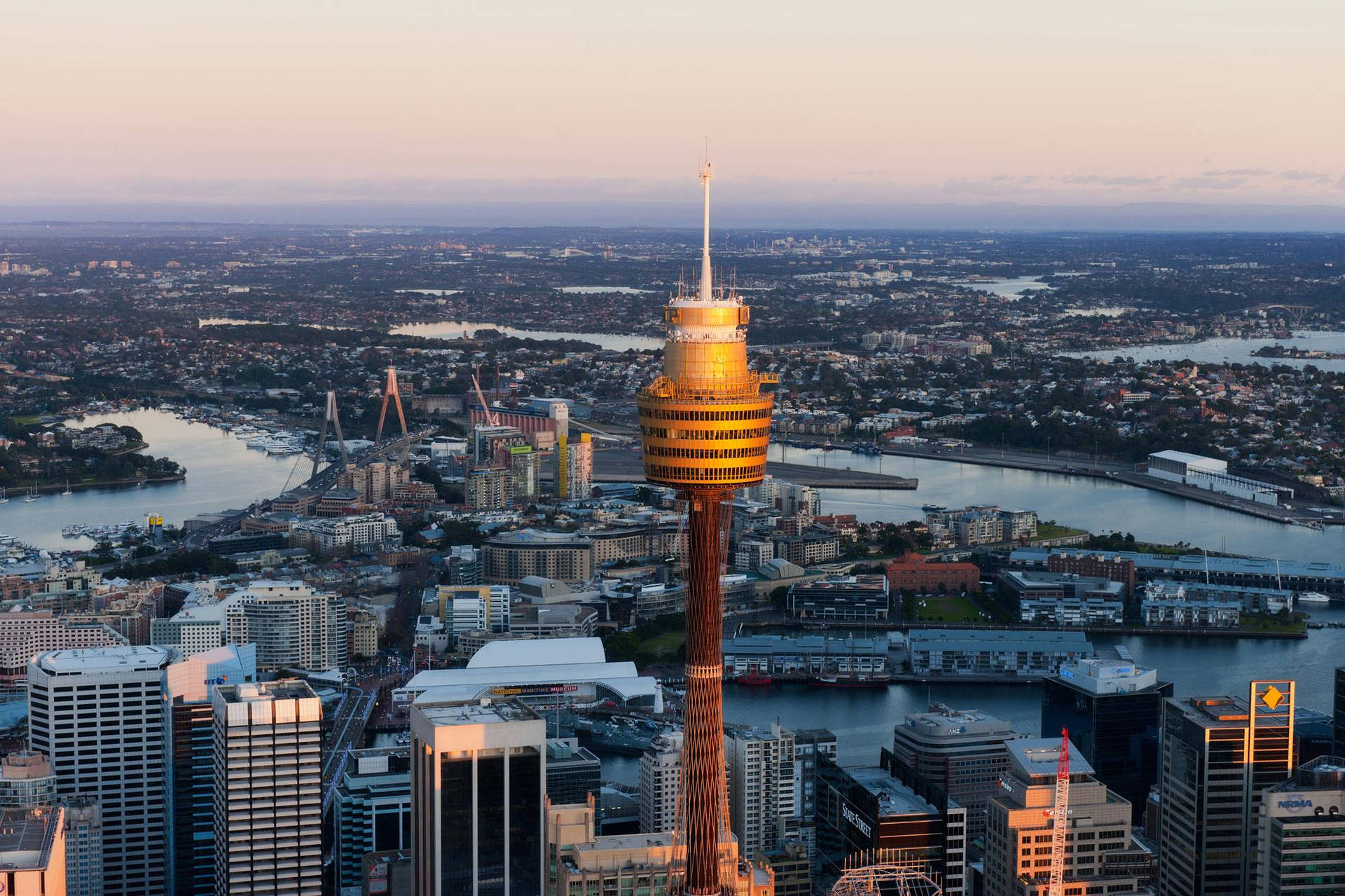Magnificent view of the Sydney Tower Eye amidst the vibrant cityscape. Wallpaper