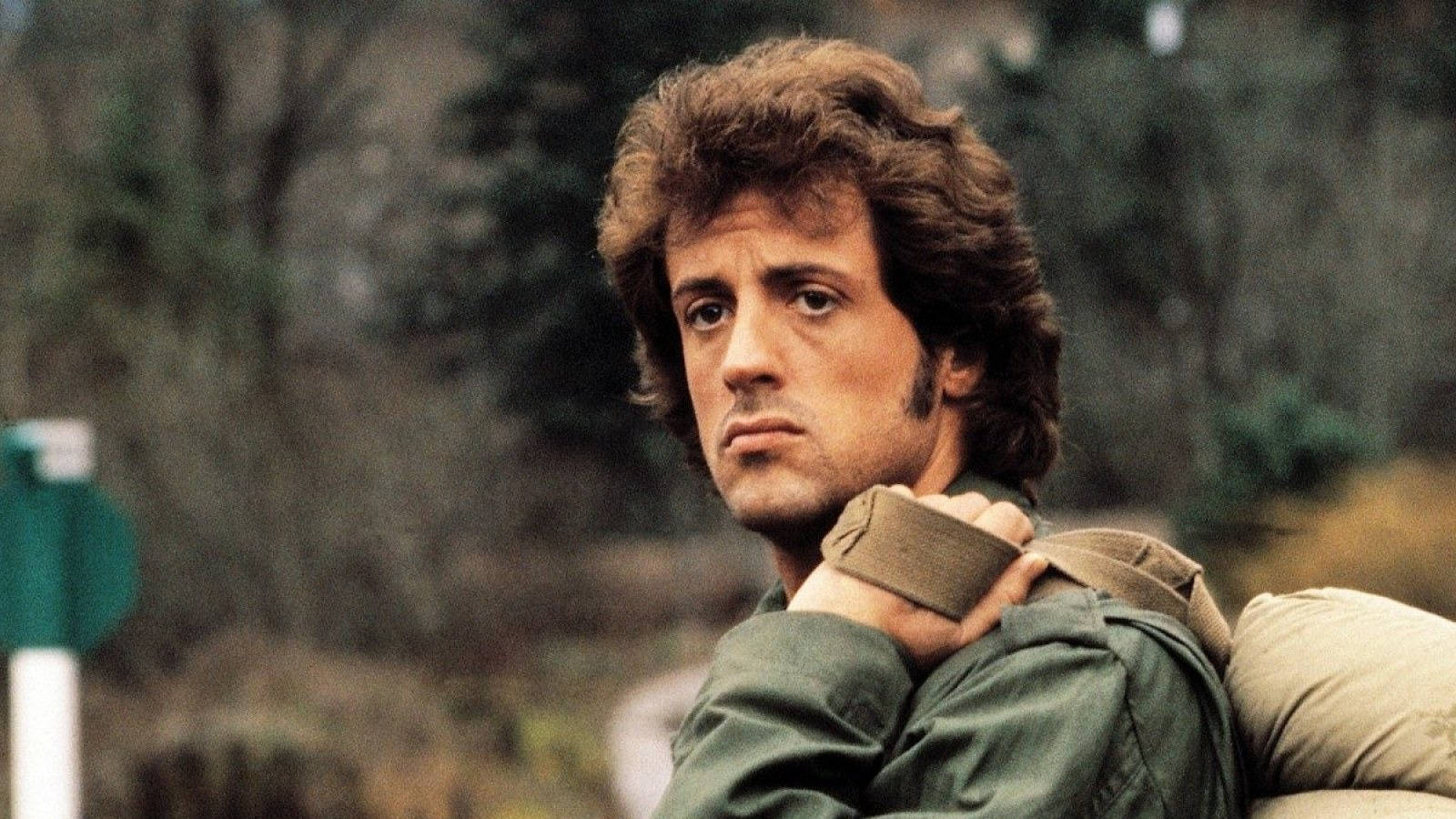 Pioneering Action Hero, Sylvester Stallone in "First Blood" Wallpaper