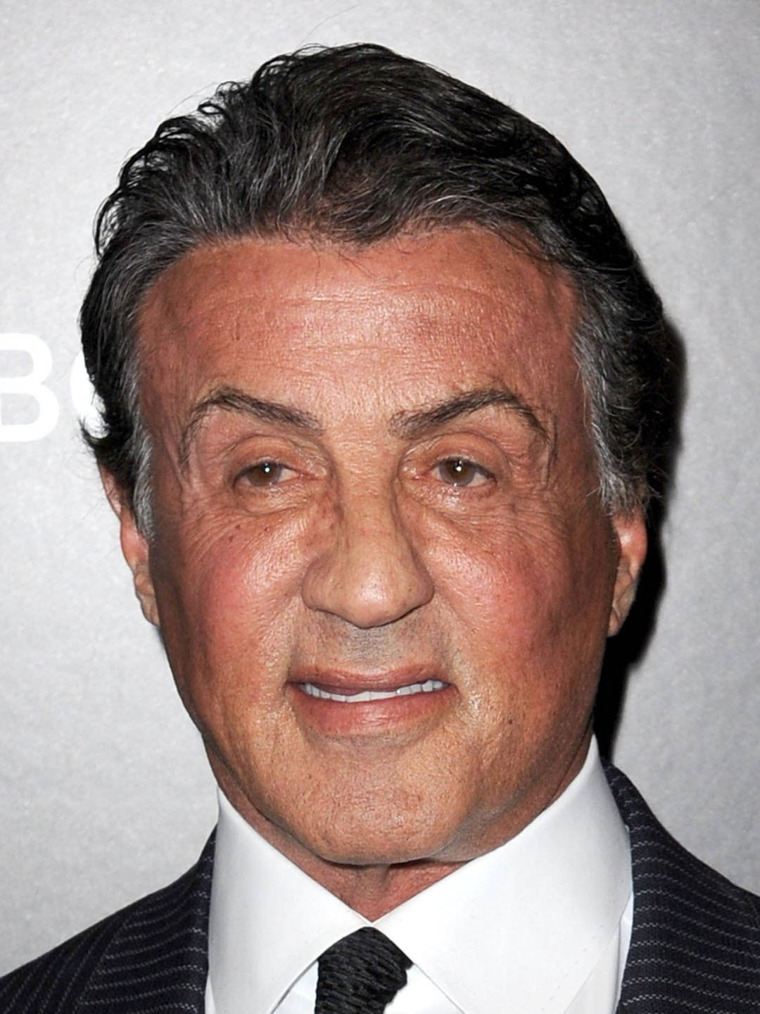 Sylvester Stallone Wearing Suit Wallpaper