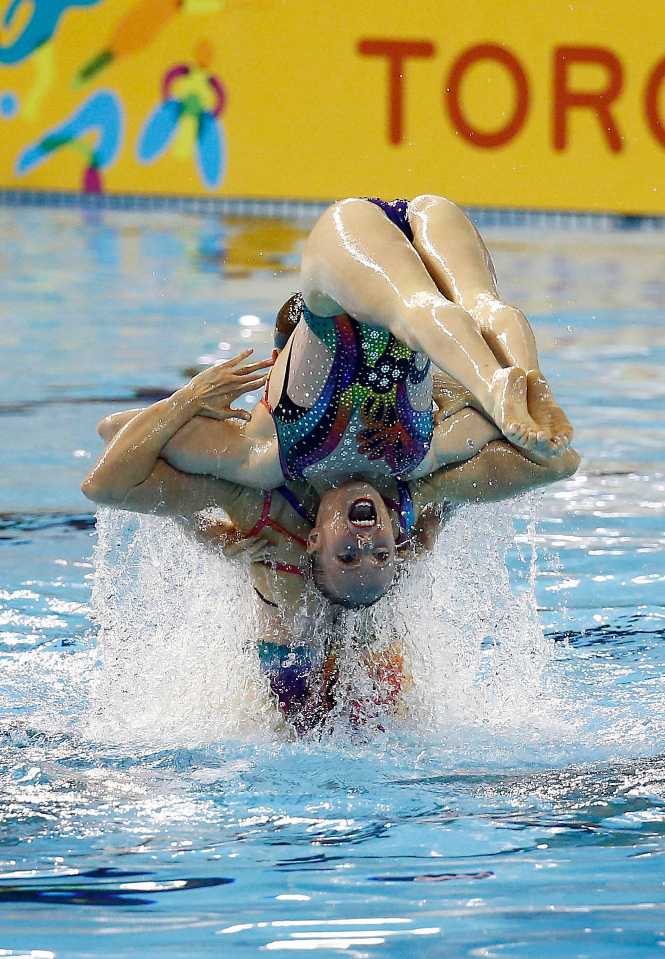 Synchronized Swimming Duo Performance Wallpaper