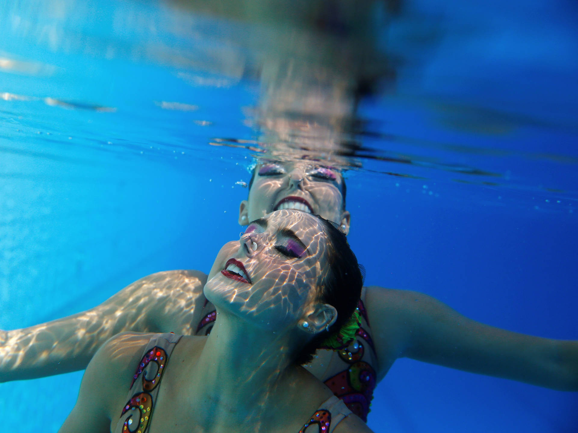Synchronized Swimming Underwater Shot Wallpaper