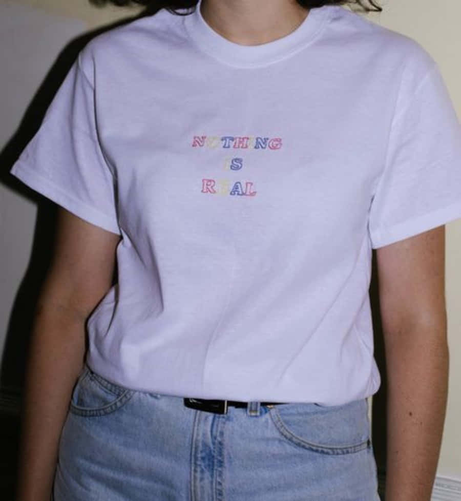 A Woman Wearing A White T - Shirt With The Words'fuck You'