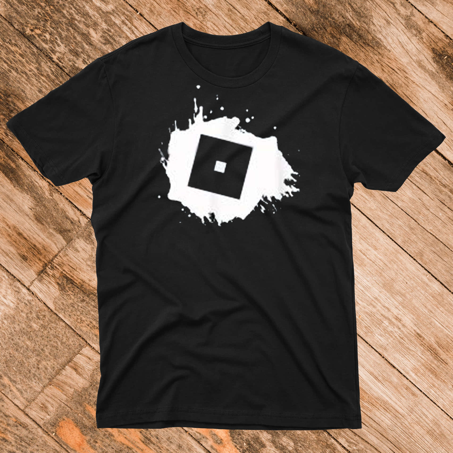 A Black T - Shirt With A Square On It