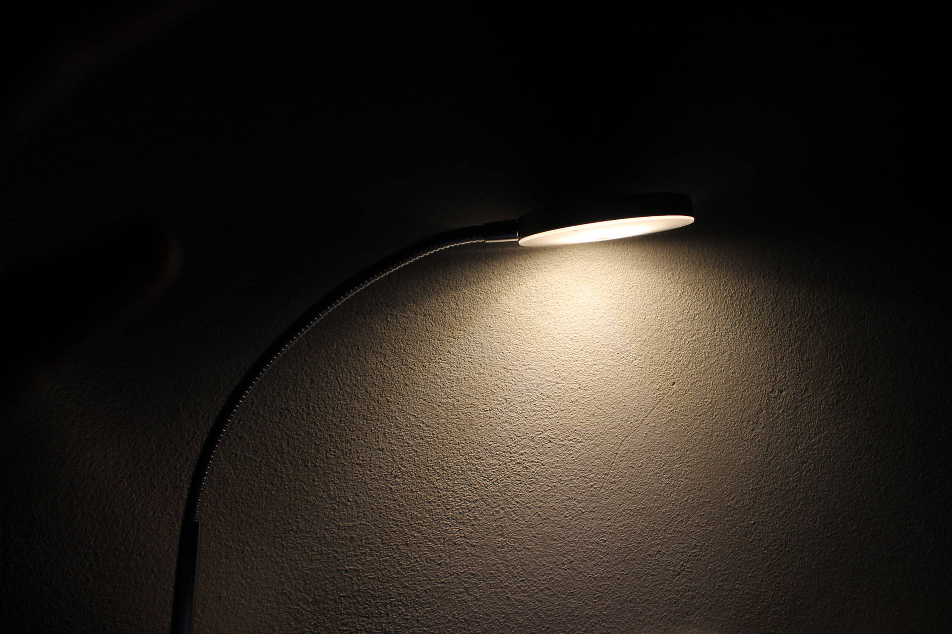 Table Lamp On Blank Black Wallpaper
