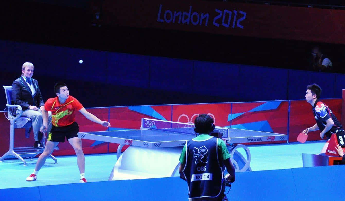 A Table Tennis Match Is Being Played
