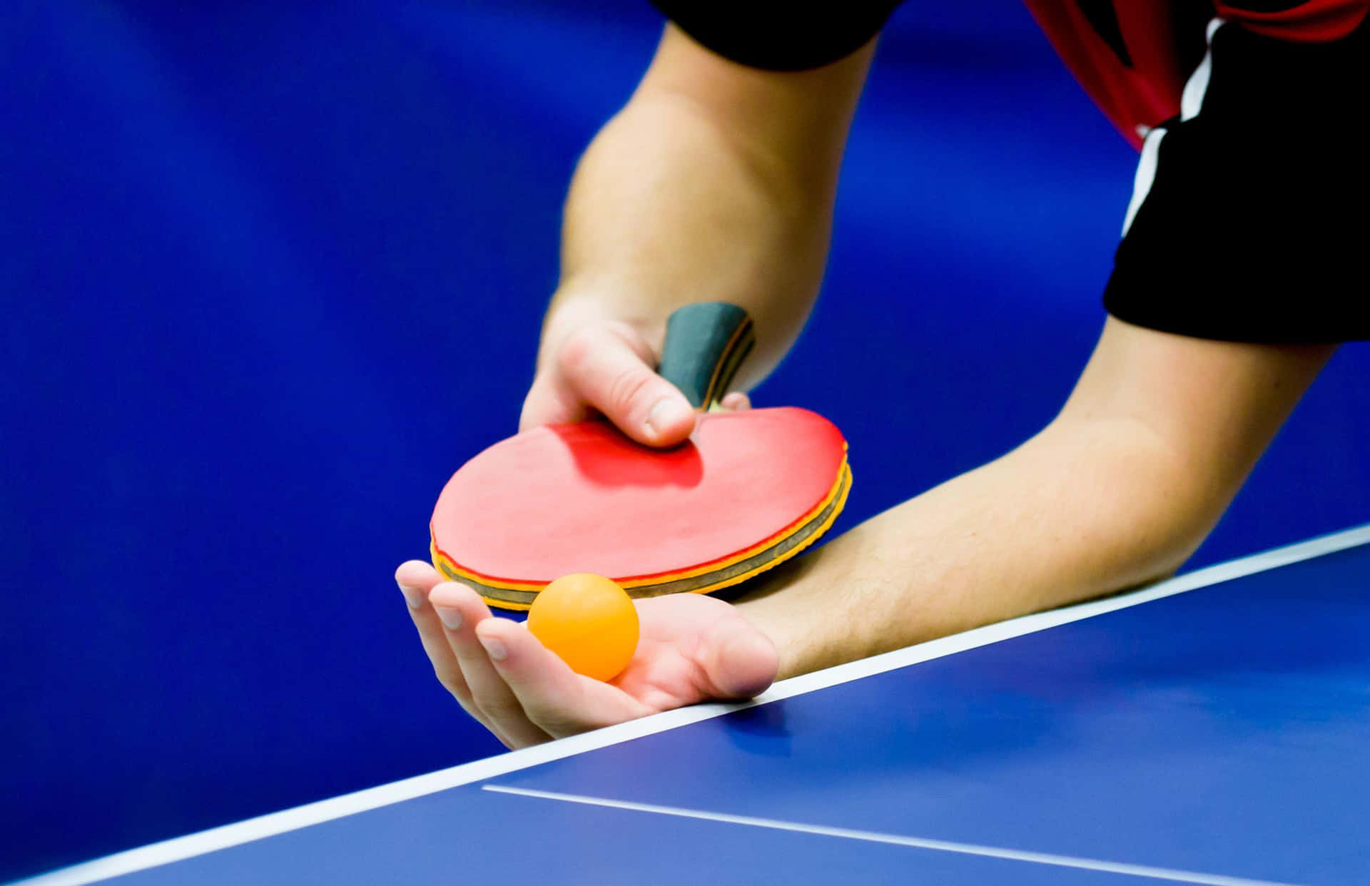 Two competitors in an epic Table Tennis match!