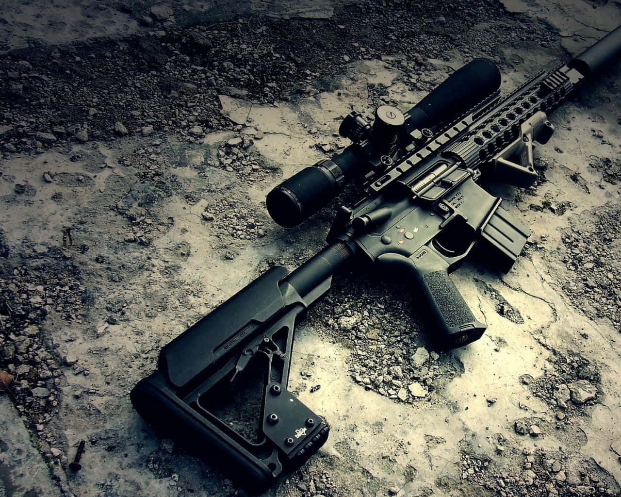 A Rifle Is Laying On The Ground Wallpaper
