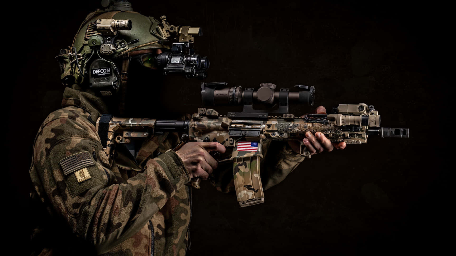 A Soldier In Camouflage Holding A Rifle Wallpaper