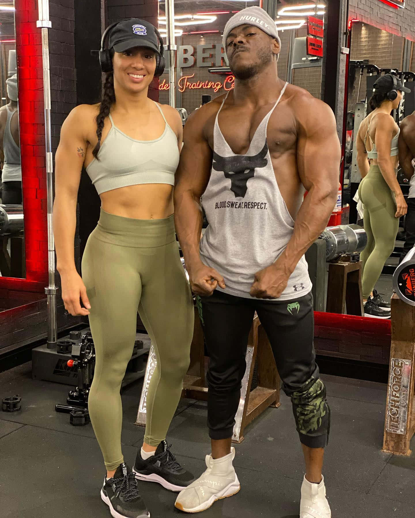 Taila Santos With Husband At Gym Background