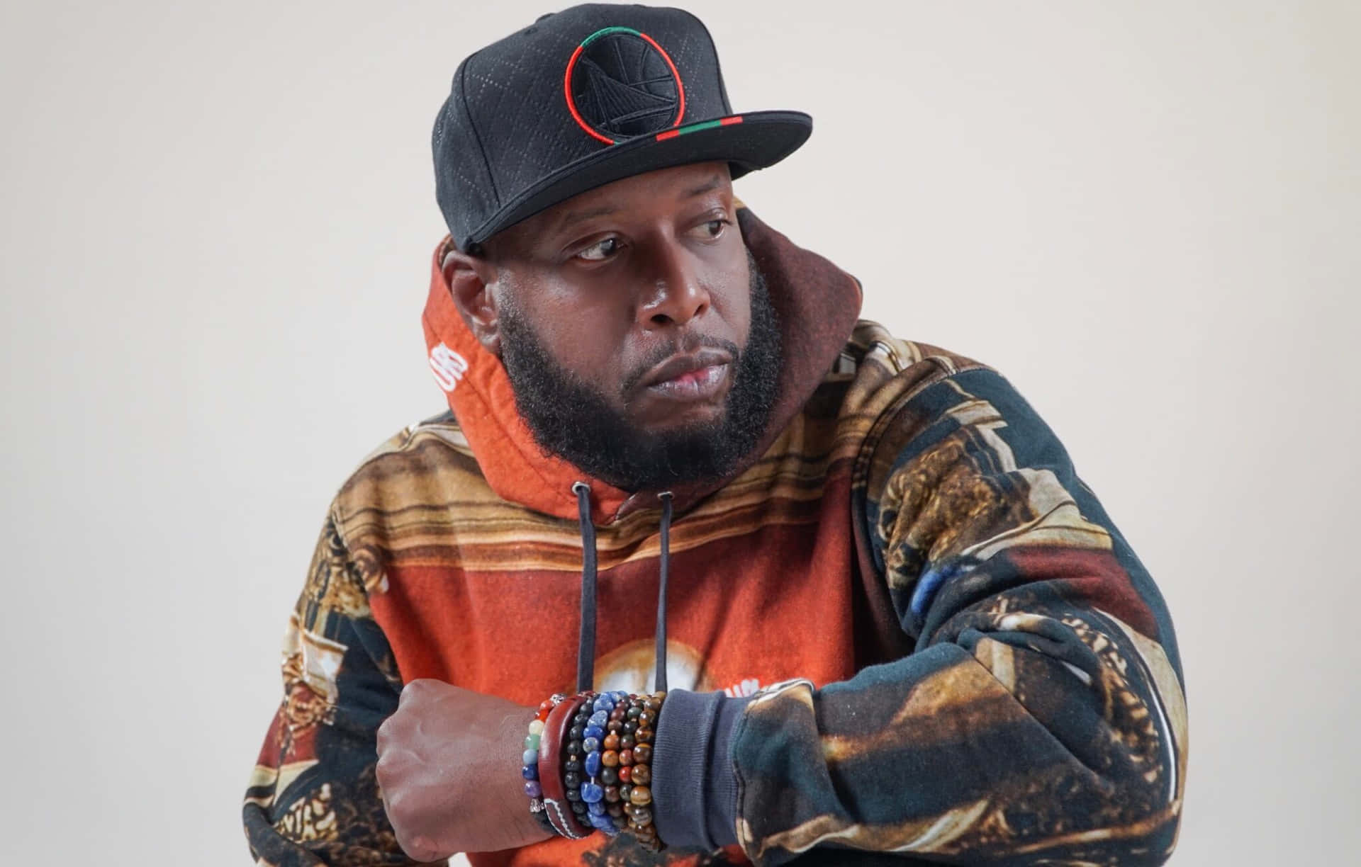 Talib Kweli Contemplative Pose Wallpaper