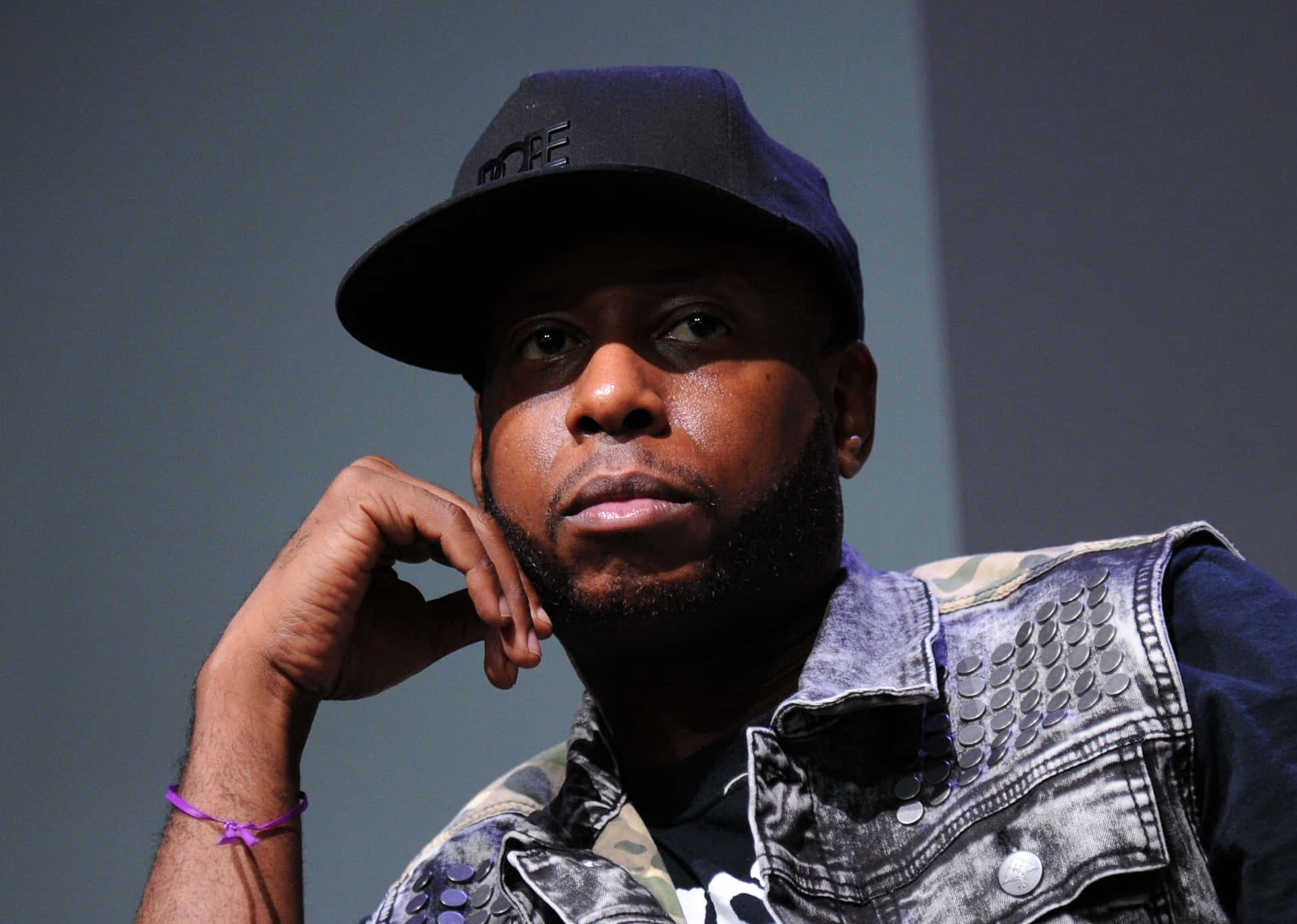 Talib Kweli Contemplative Pose Wallpaper