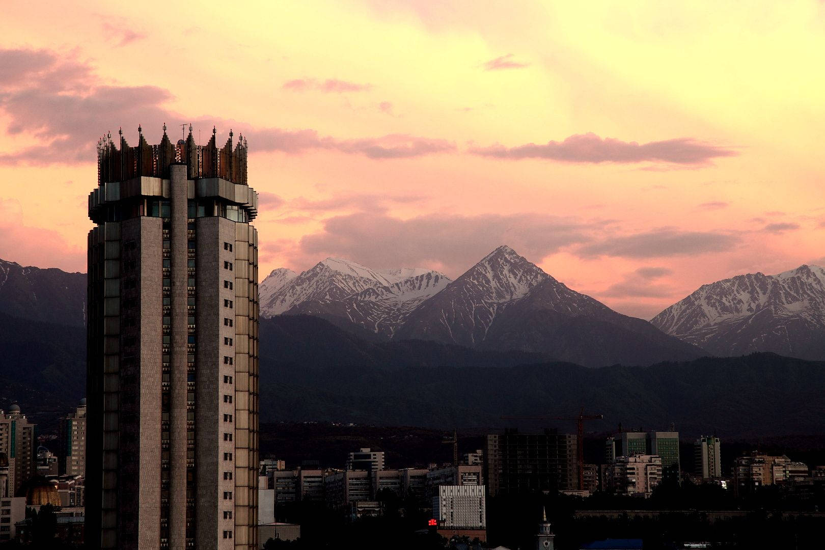 Tall Almaty Building In Sunset Wallpaper