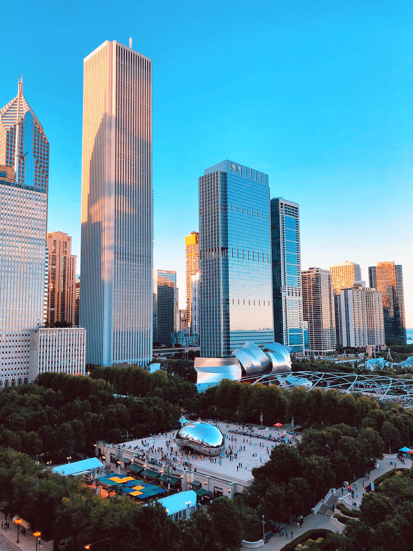 Tall Buildings Near Cloud Gate In Chicago Wallpaper