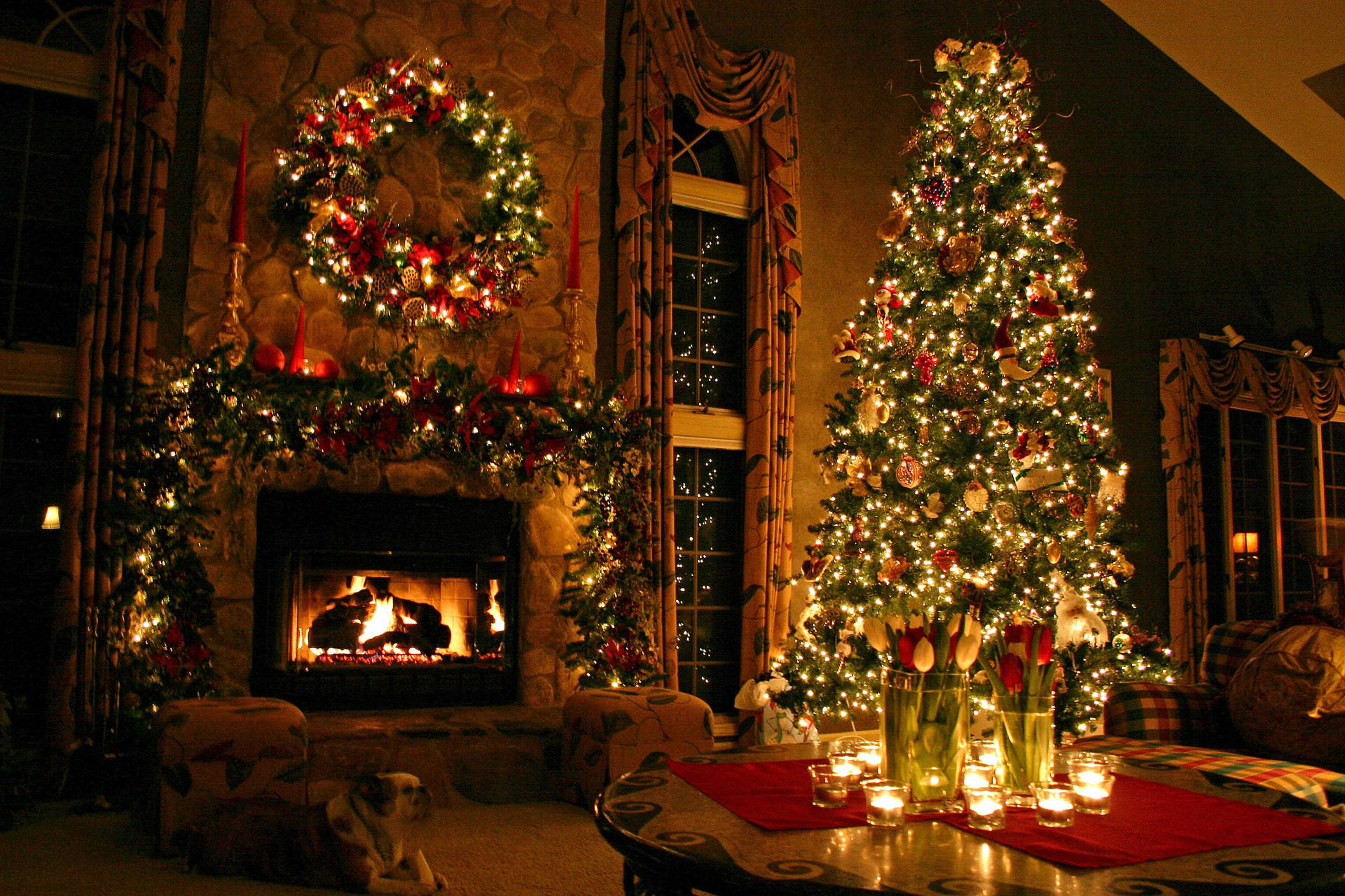 A Tall Christmas Tree Brightens the Fireplace Wallpaper