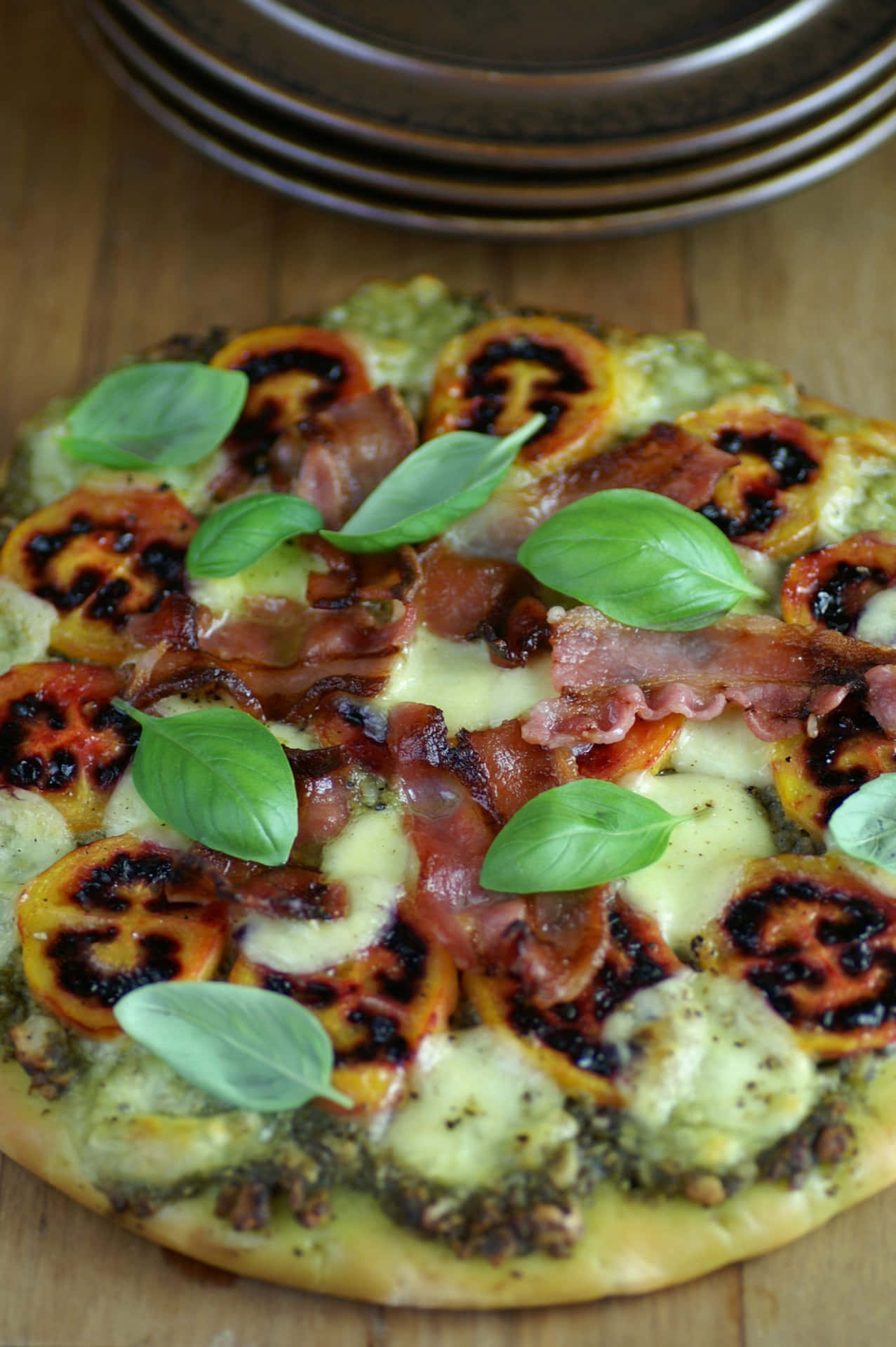 Tamarillo Pizza Topped With Basil Leaves Wallpaper
