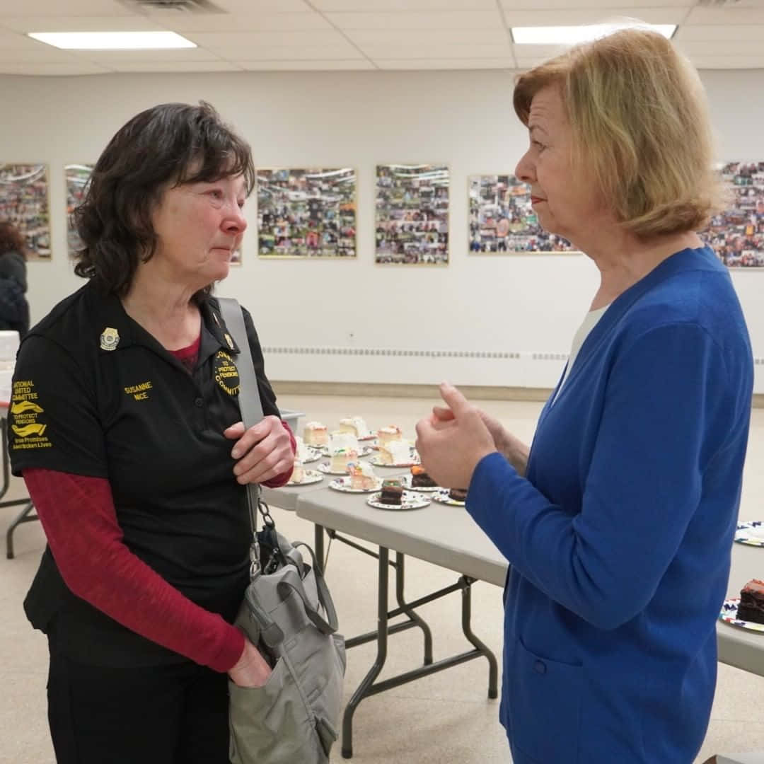 Tammy Baldwin Engaging with Retirees Wallpaper