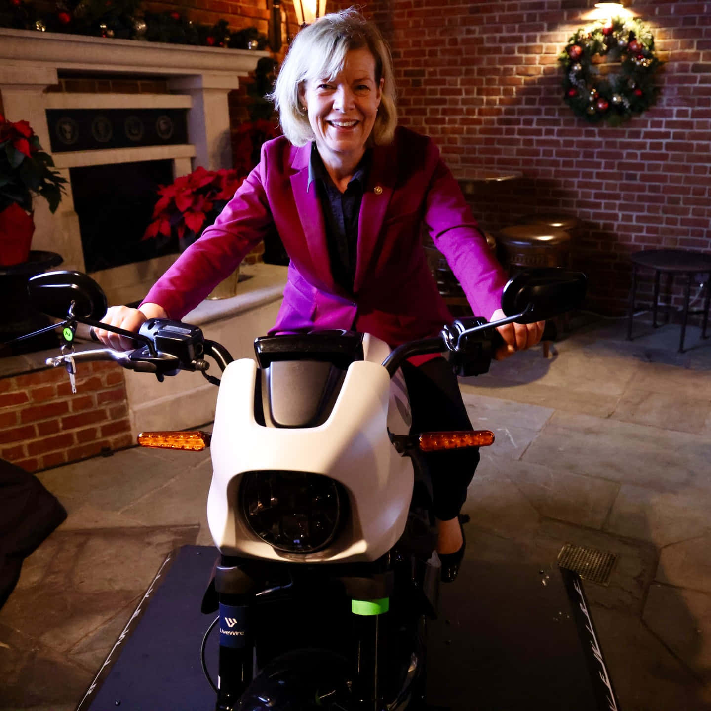 Tammy Baldwin With Motorcycle Wallpaper