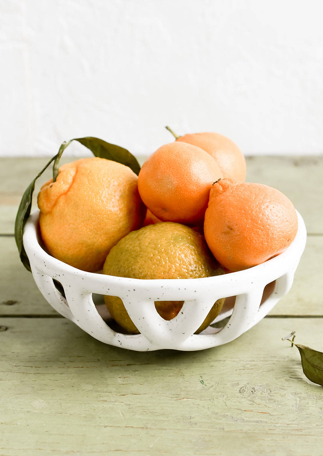 Fruttadi Tangelo In Una Elegante Ciotola Sfondo