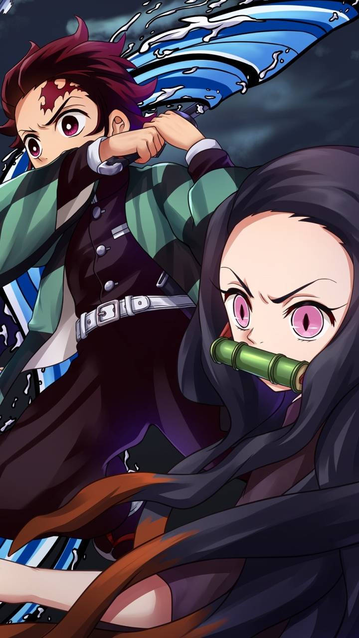 Tanjiro and Nezuko fight against evil together. Wallpaper